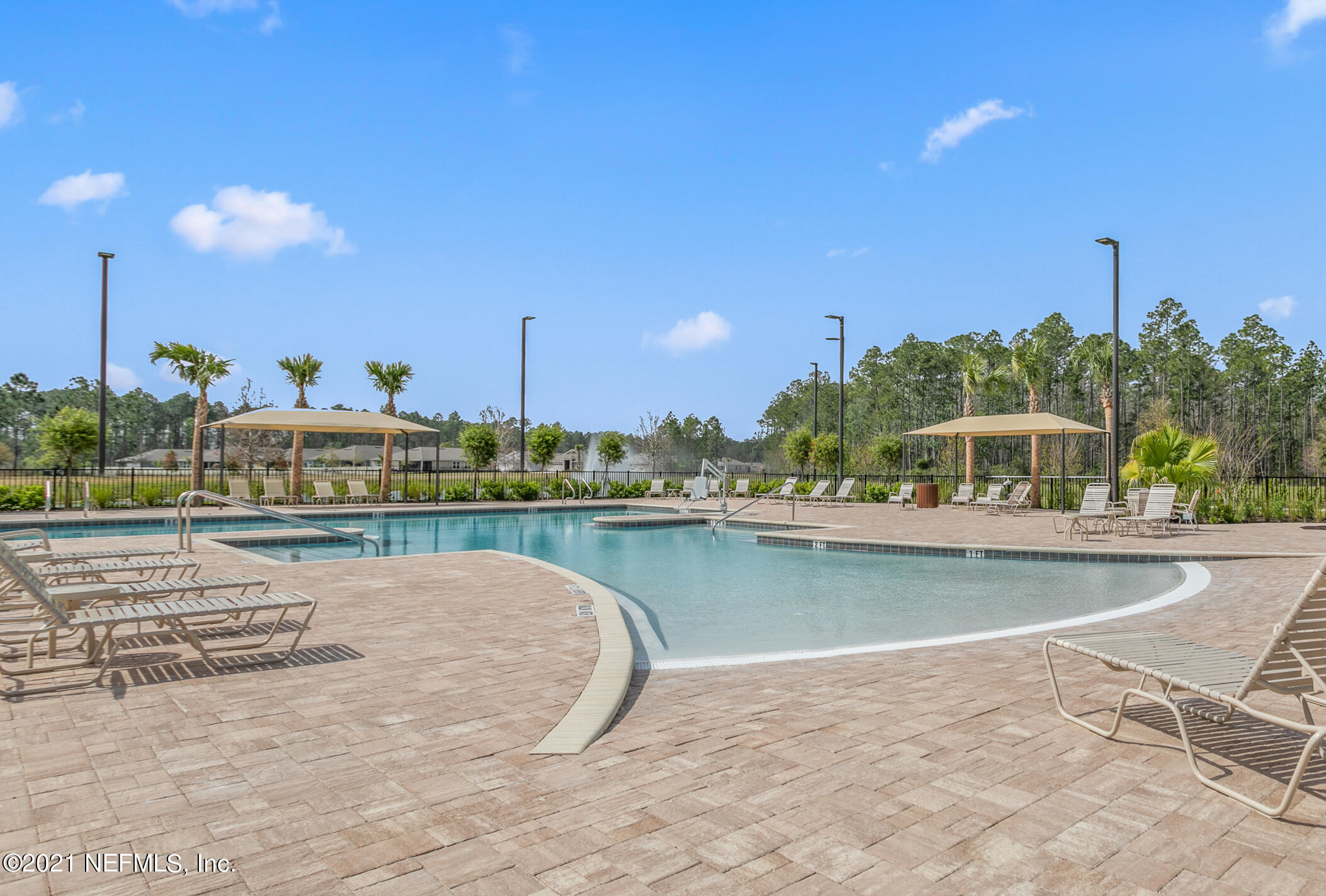 1360 Parkland Trail St. Augustine, FL 32095 - Photo 30 of 37 a view of a swimming pool and outdoor space