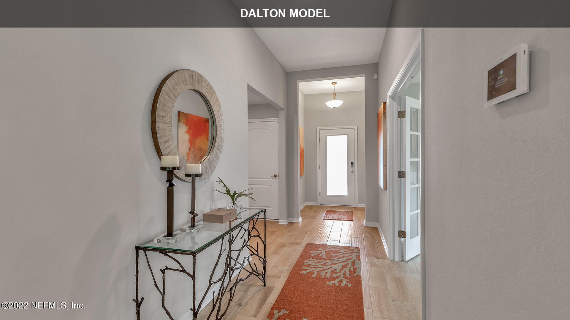 1360 Parkland Trail St. Augustine, FL 32095 - Photo 5 of 37 a view of a hallway with wooden floor and entryway