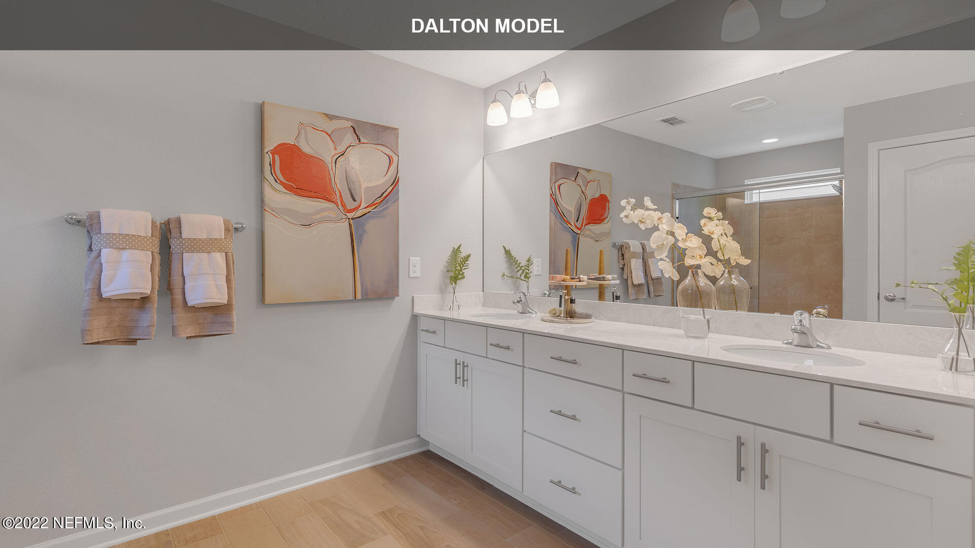 1360 Parkland Trail St. Augustine, FL 32095 - Photo 10 of 37 a bathroom with a double vanity sink and a mirror