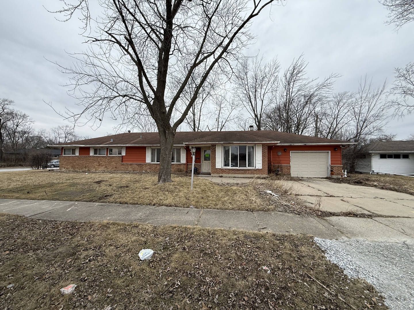 202 Wilson Street Park Forest, IL 60466 - Photo 1 of 9 a front view of a house with a yard