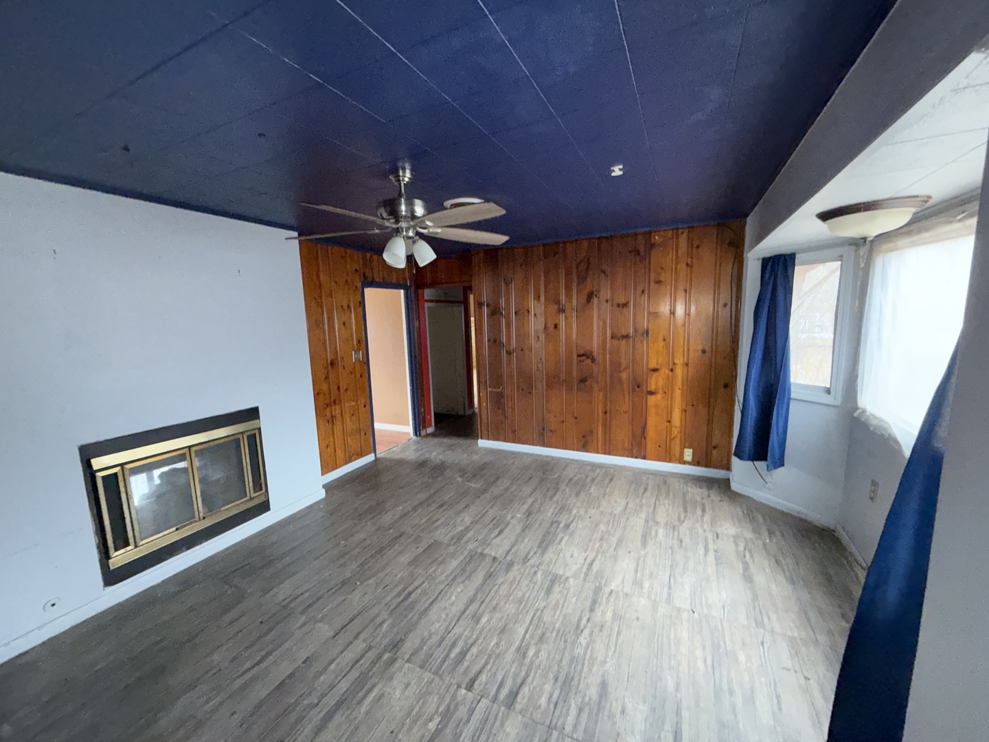 202 Wilson Street Park Forest, IL 60466 - Photo 2 of 9 a view of an empty room with a fireplace