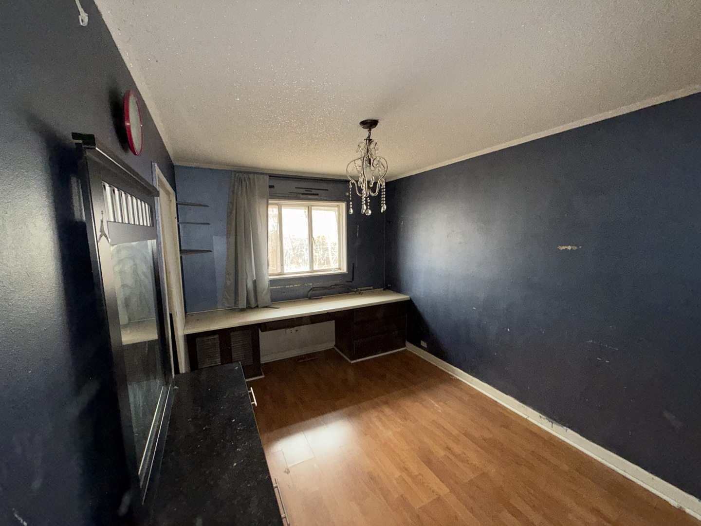 202 Wilson Street Park Forest, IL 60466 - Photo 5 of 9 wooden floor in an empty room with a window