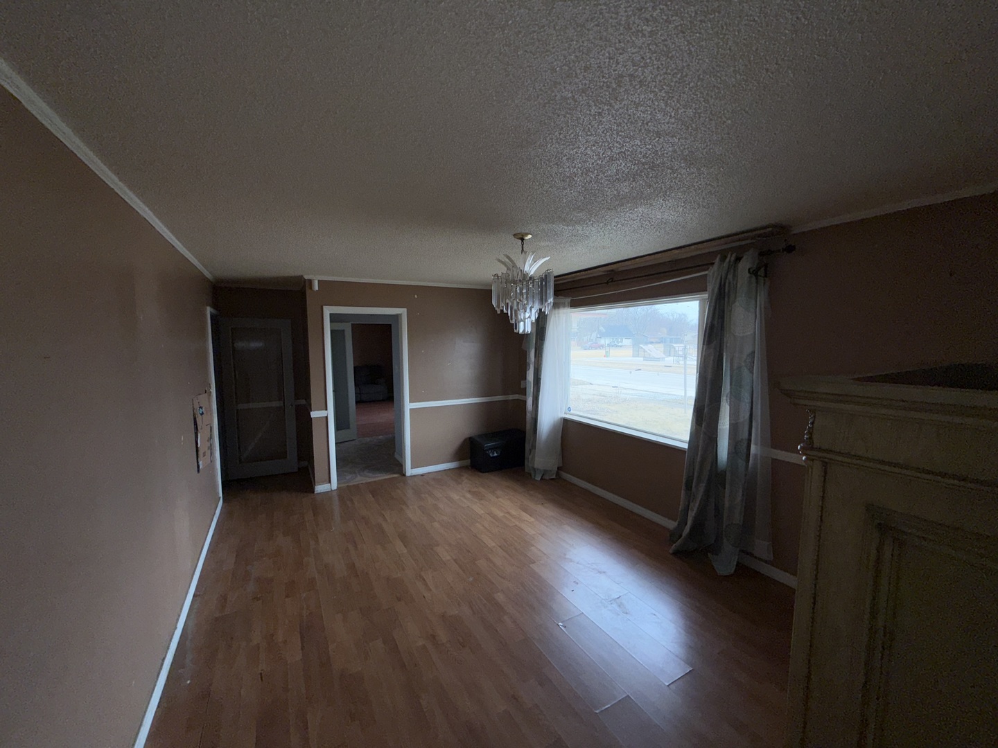 202 Wilson Street Park Forest, IL 60466 - Photo 7 of 9 a view of a room with wooden floor and windows