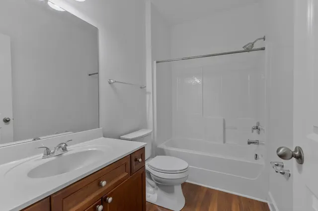 a view of empty room with windows