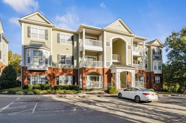 a view of a building with a street
