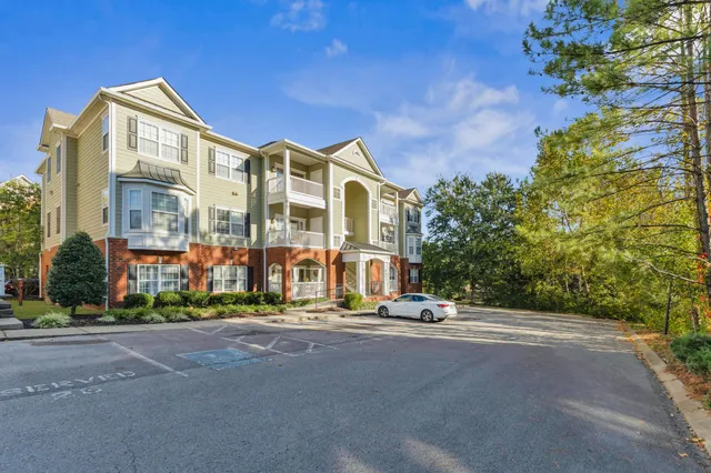 a view of a building with a street