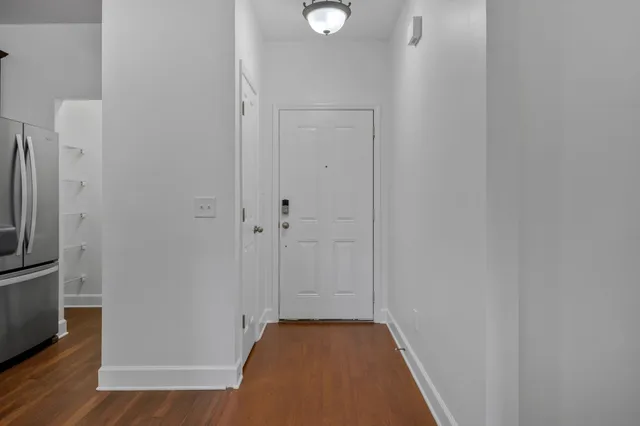 a kitchen with stainless steel appliances granite countertop a stove and a sink