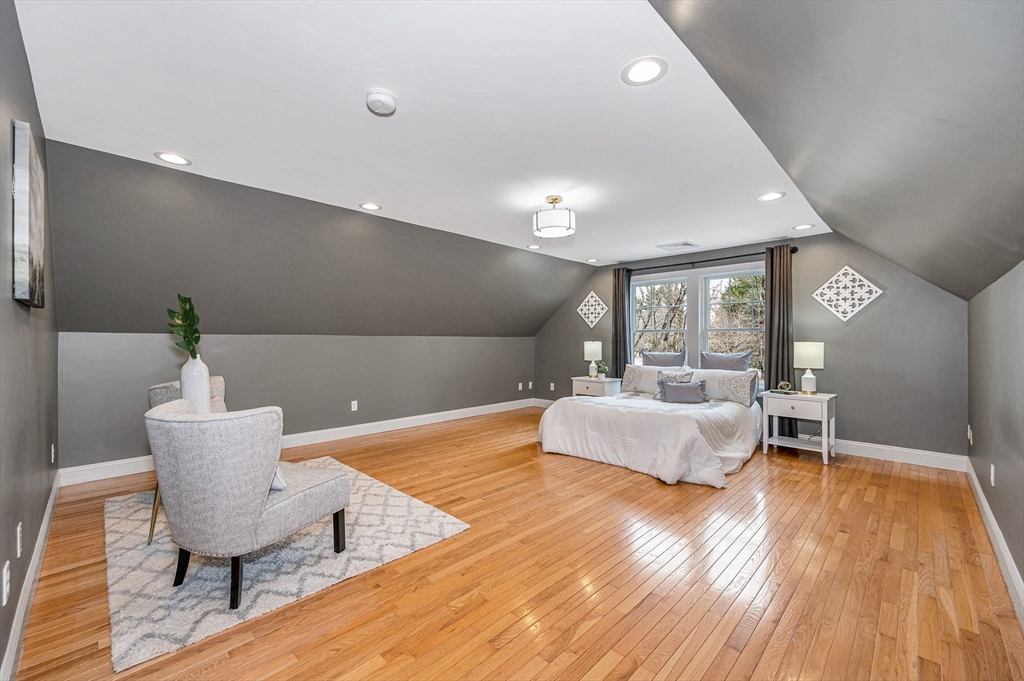 29 Washington Street Boxford, MA 01921 - Photo 18 of 39 a living room with furniture and a wooden floor