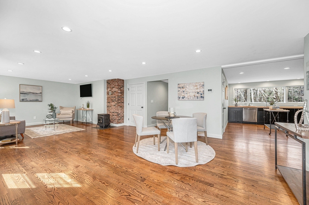 29 Washington Street Boxford, MA 01921 - Photo 2 of 39 a living room with furniture and view of kitchen