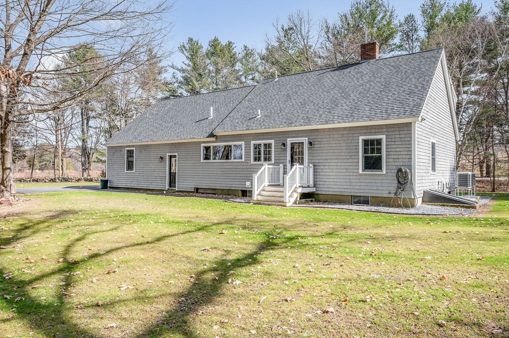 29 Washington Street Boxford, MA 01921 - Photo 38 of 39 a view of a house with a swimming pool