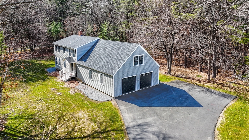 29 Washington Street Boxford, MA 01921 - Photo 39 of 39 an aerial view of a house with swimming pool