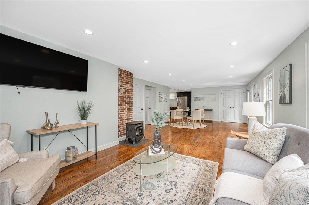 29 Washington Street Boxford, MA 01921 - Photo 6 of 39 a living room with furniture and a flat screen tv