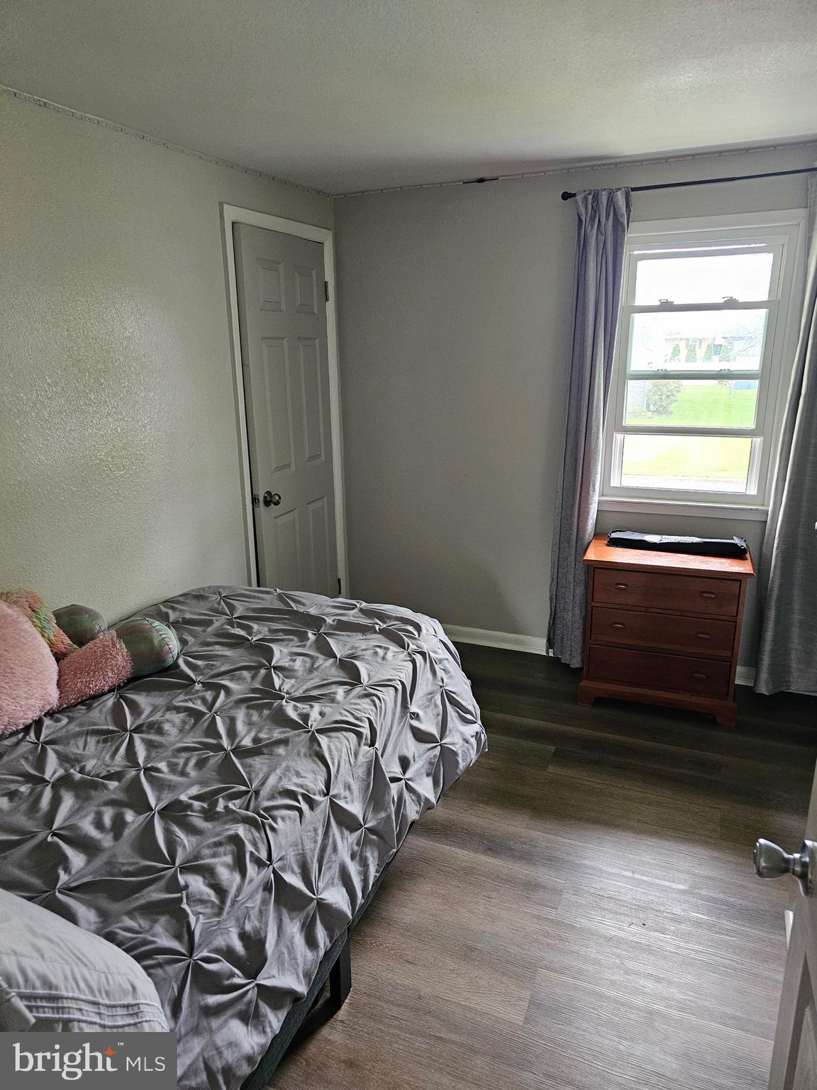 85 Hamilton Road Chambersburg, PA 17201 - Photo 6 of 13 a bedroom with a bed and a window