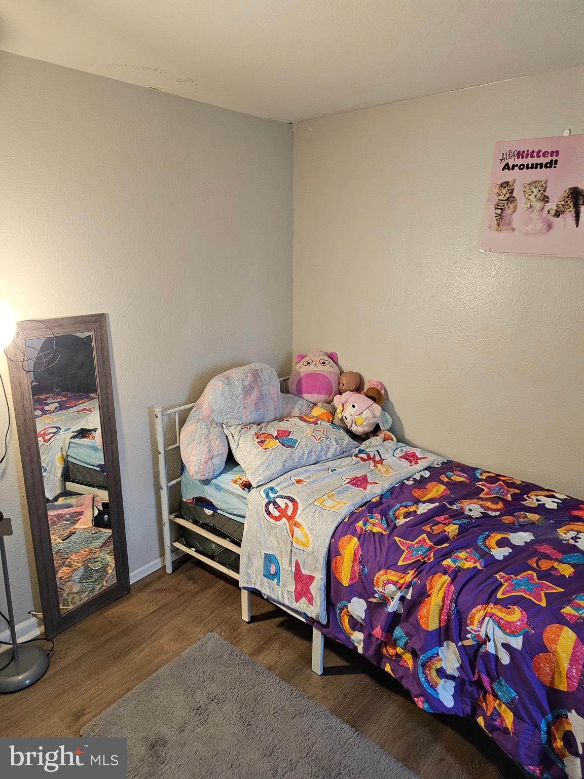 85 Hamilton Road Chambersburg, PA 17201 - Photo 8 of 13 a bedroom with a bed and a painting on the wall
