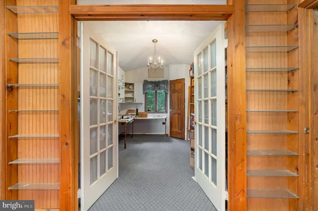 a bathroom with a sink a toilet and shower curtain