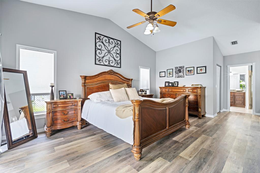 5133 Northwest 47th Avenue Coconut Creek, FL 33073 - Photo 21 of 44 a living room with furniture and a flat screen tv