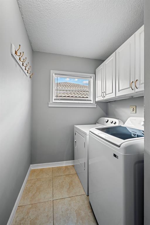 5133 Northwest 47th Avenue Coconut Creek, FL 33073 - Photo 34 of 44 a utility room with dryer and washer