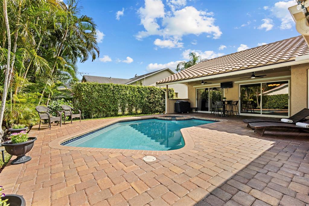 5133 Northwest 47th Avenue Coconut Creek, FL 33073 - Photo 38 of 44 a view of outdoor space yard and patio
