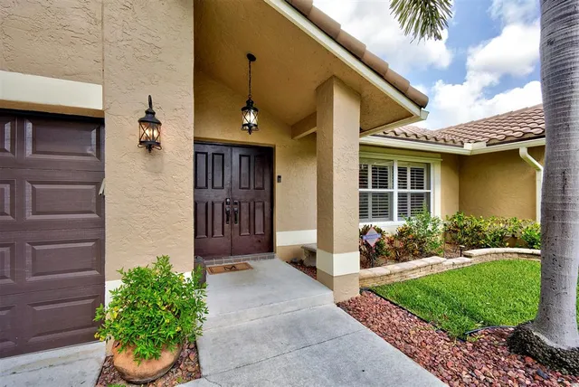 a front view of a house with a porch