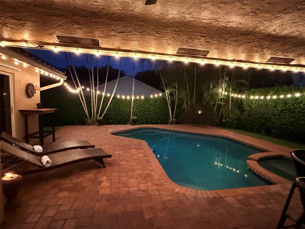 5133 Northwest 47th Avenue Coconut Creek, FL 33073 - Photo 42 of 44 a view of swimming pool