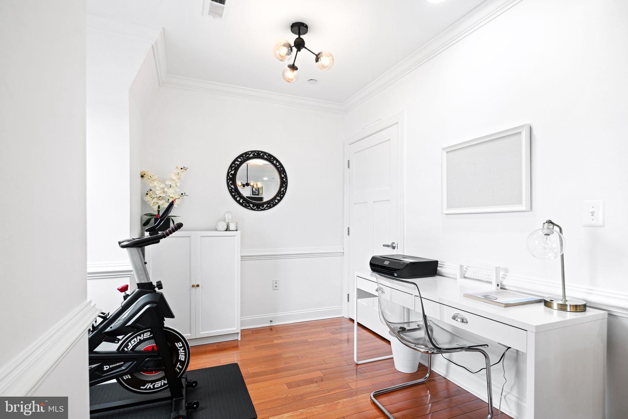 30 Kings Court, Unit 307 Haddonfield, NJ 08033 - Photo 6 of 15 a picture of a room with wooden floor