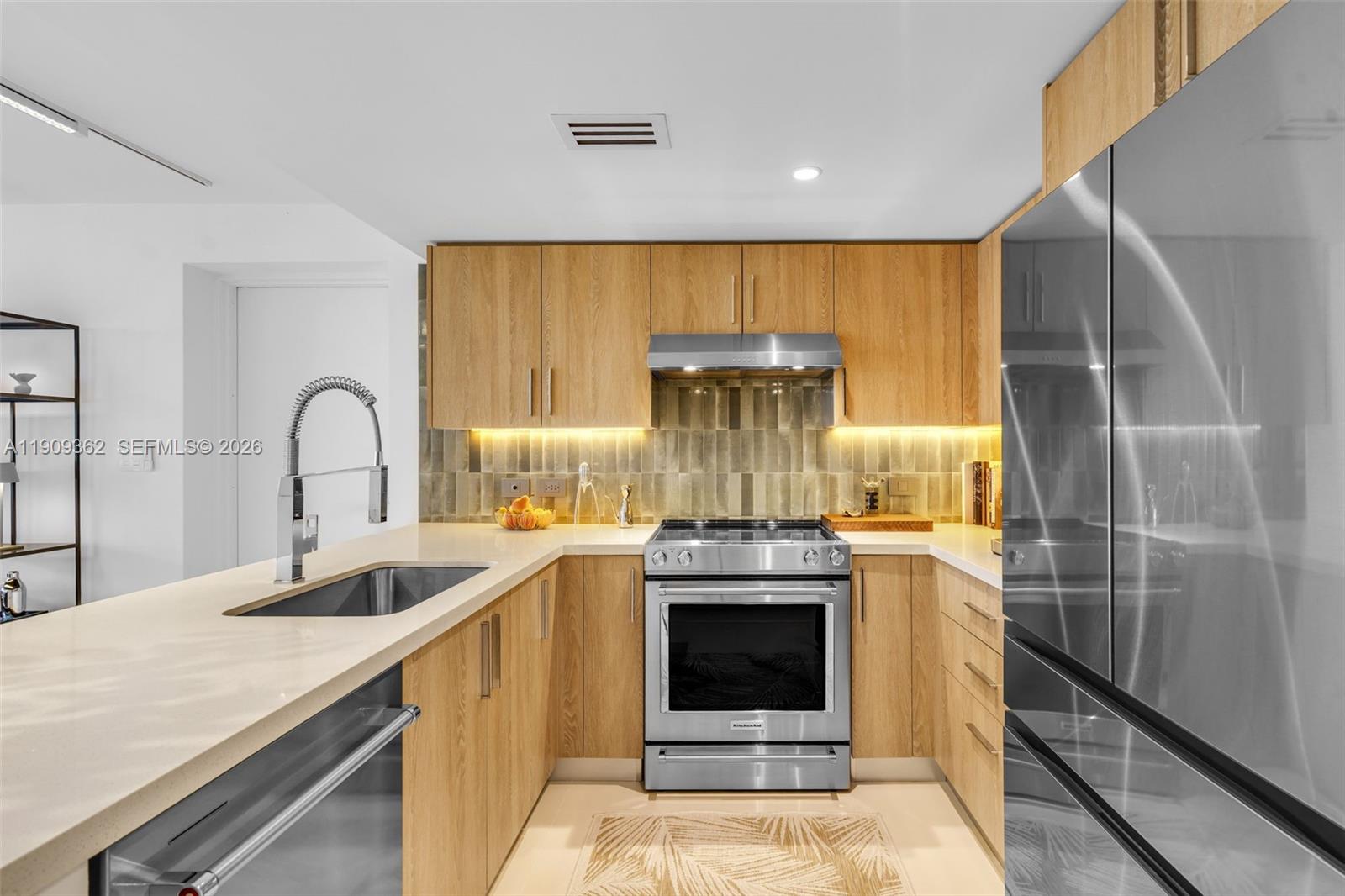 1100 100th Street, Unit 401 Bay Harbor Islands, FL 33154 - Photo 12 of 47 Upgraded Appliances & Tile Backsplash