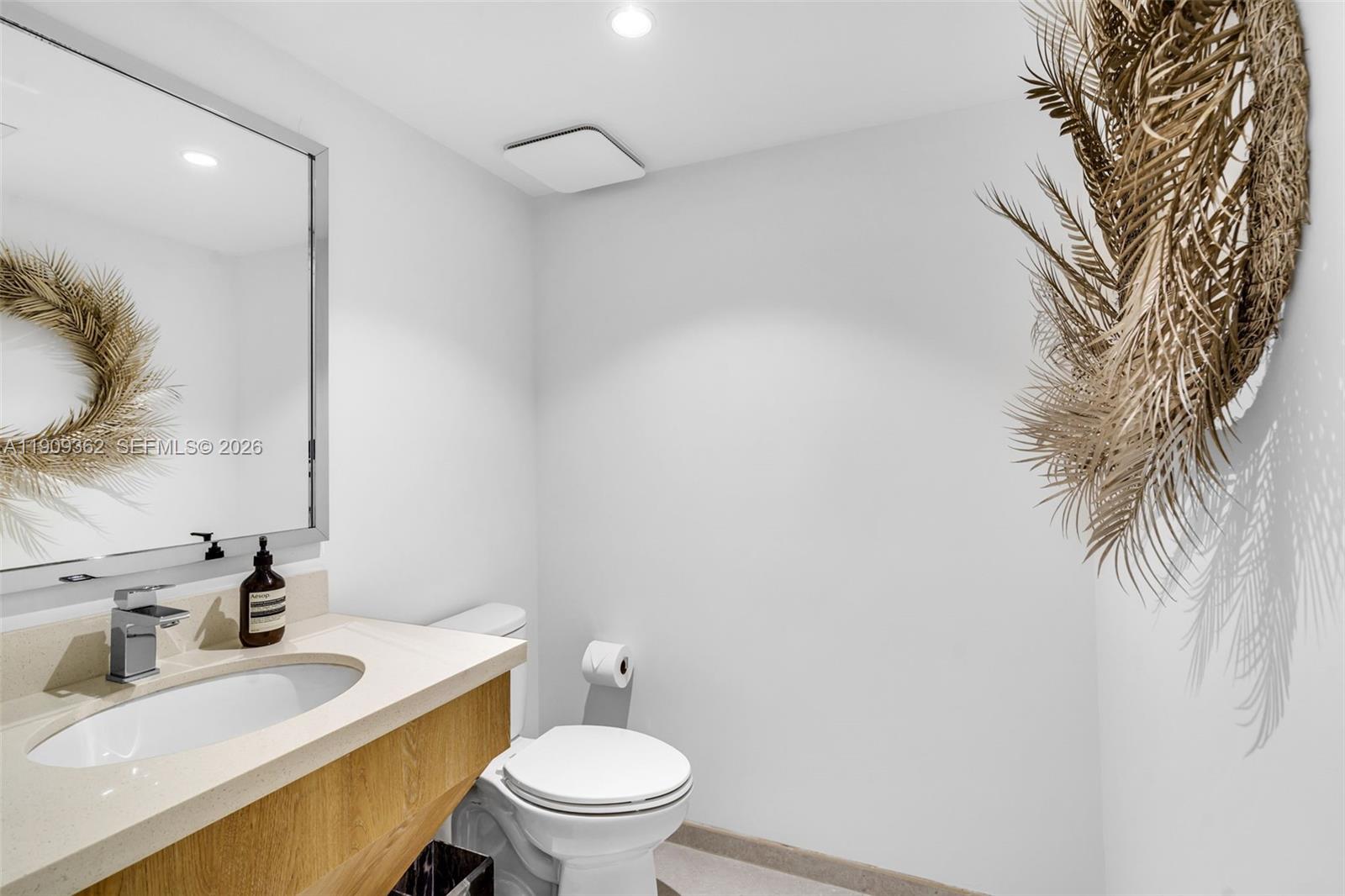 1100 100th Street, Unit 401 Bay Harbor Islands, FL 33154 - Photo 14 of 47 Powder Room