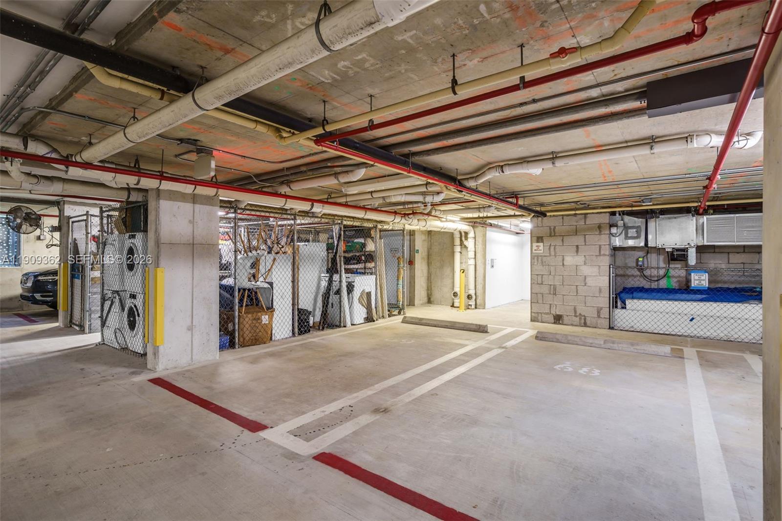 1100 100th Street, Unit 401 Bay Harbor Islands, FL 33154 - Photo 47 of 47 2 Assigned Side-By-Side Spaces on Level 2 Parking with Adjacent Storage