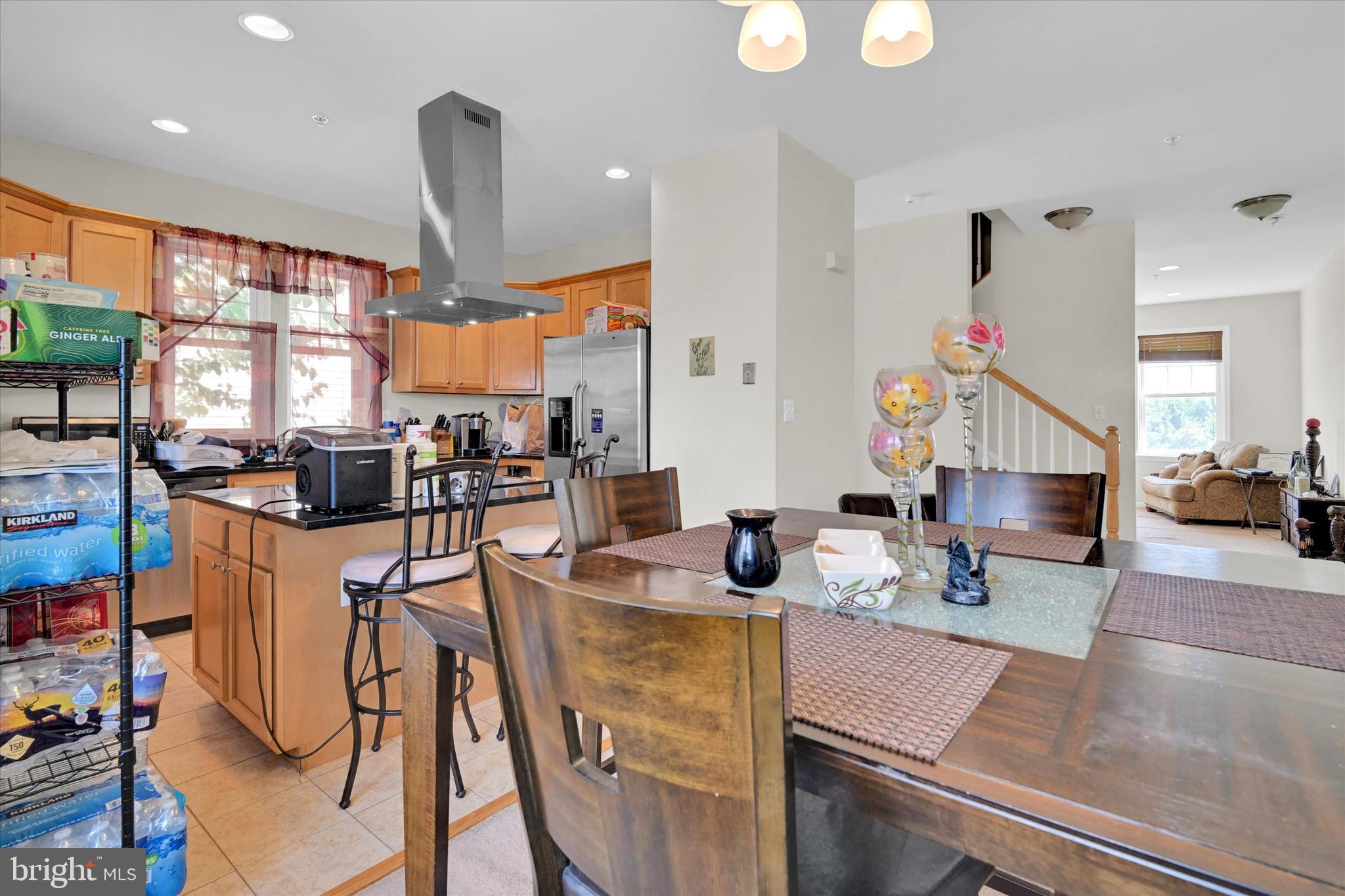 2380 Elvans Road Southeast Washington, DC 20020 - Photo 15 of 27 a kitchen with stainless steel appliances granite countertop sink stove and refrigerator