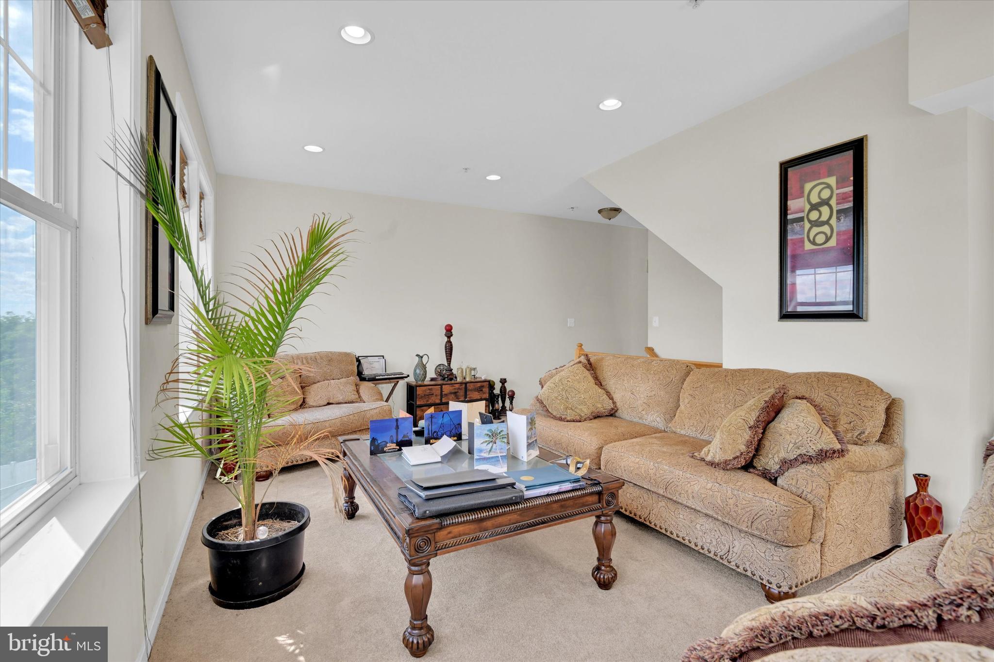 2380 Elvans Road Southeast Washington, DC 20020 - Photo 17 of 27 a living room with furniture potted plant and a window
