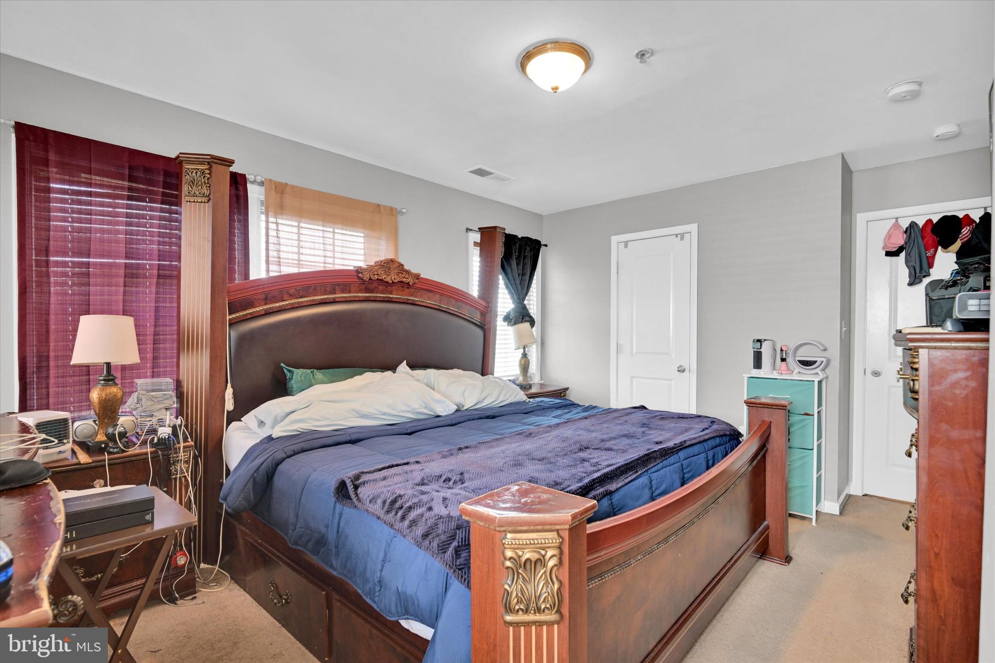 2380 Elvans Road Southeast Washington, DC 20020 - Photo 23 of 27 a bedroom with a bed and a large window