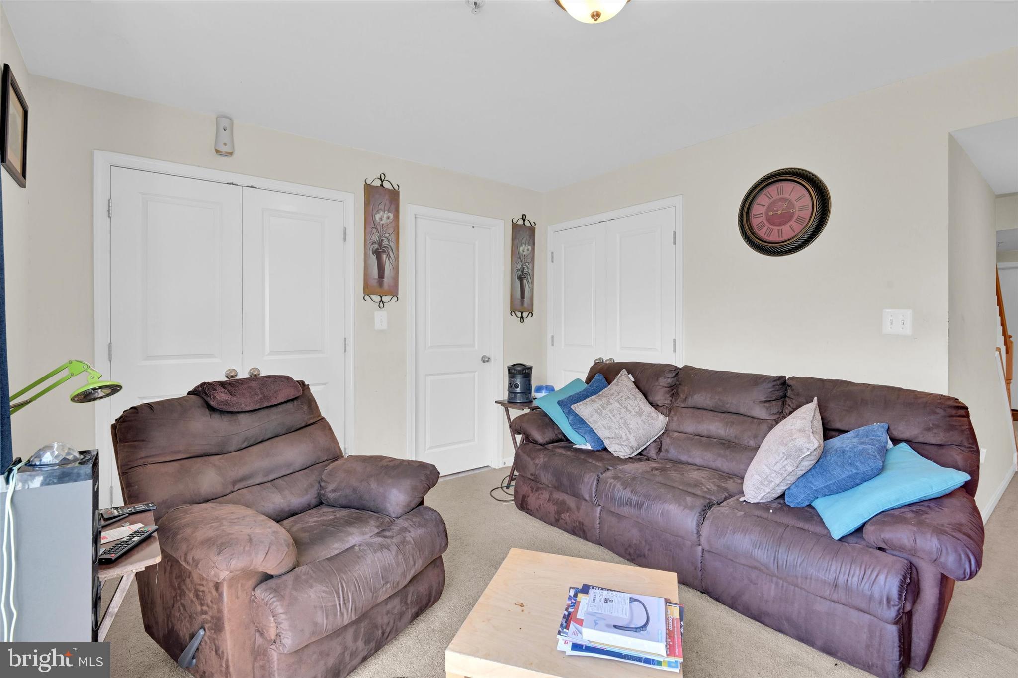 2380 Elvans Road Southeast Washington, DC 20020 - Photo 3 of 27 a living room with furniture a couch and a lamp