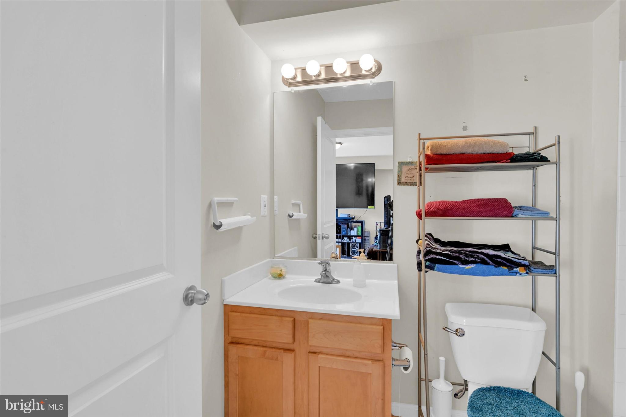 2380 Elvans Road Southeast Washington, DC 20020 - Photo 8 of 27 a bathroom with a sink and a mirror