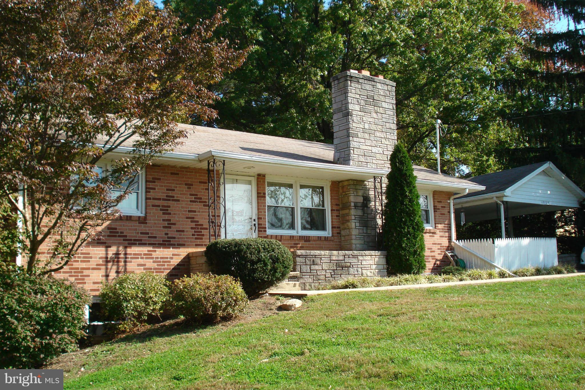 15725 Barnesville Road Boyds, MD 20841 - Photo 1 of 11 a front view of house with yard and green space