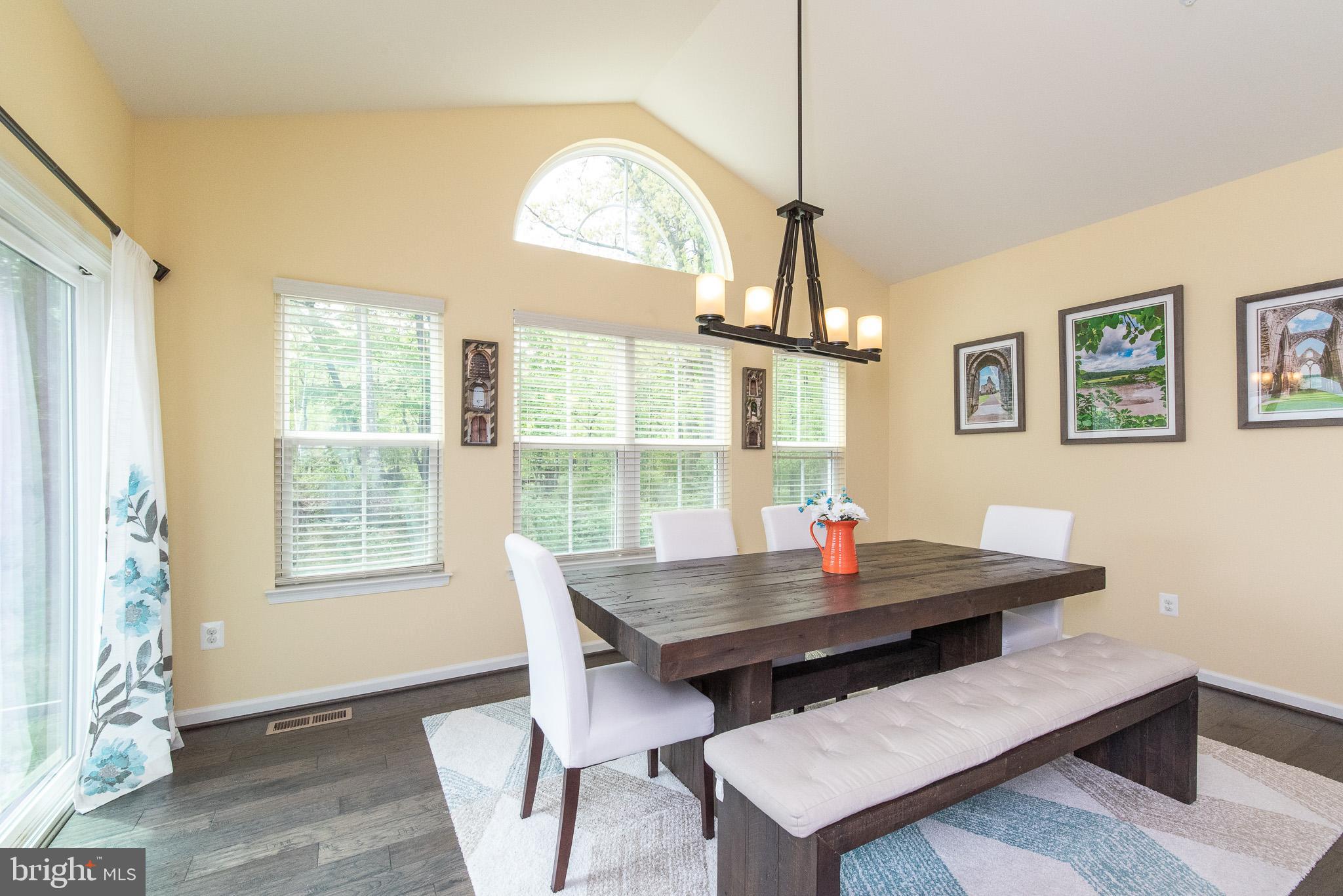 10426 Windlass Run Road Baltimore, MD 21220 - Photo 17 of 56 a view of a workspace with furniture and a window