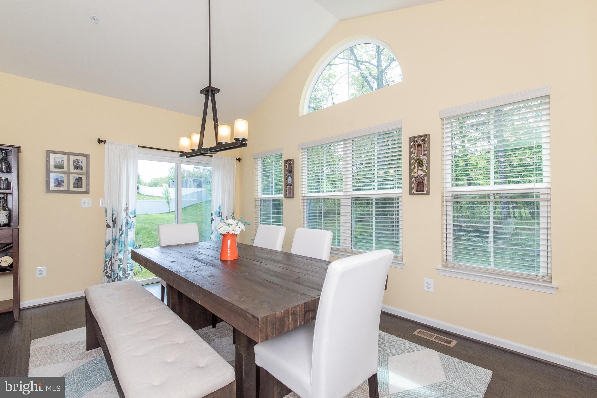 10426 Windlass Run Road Baltimore, MD 21220 - Photo 19 of 56 a view of a dining room with furniture window and outside view