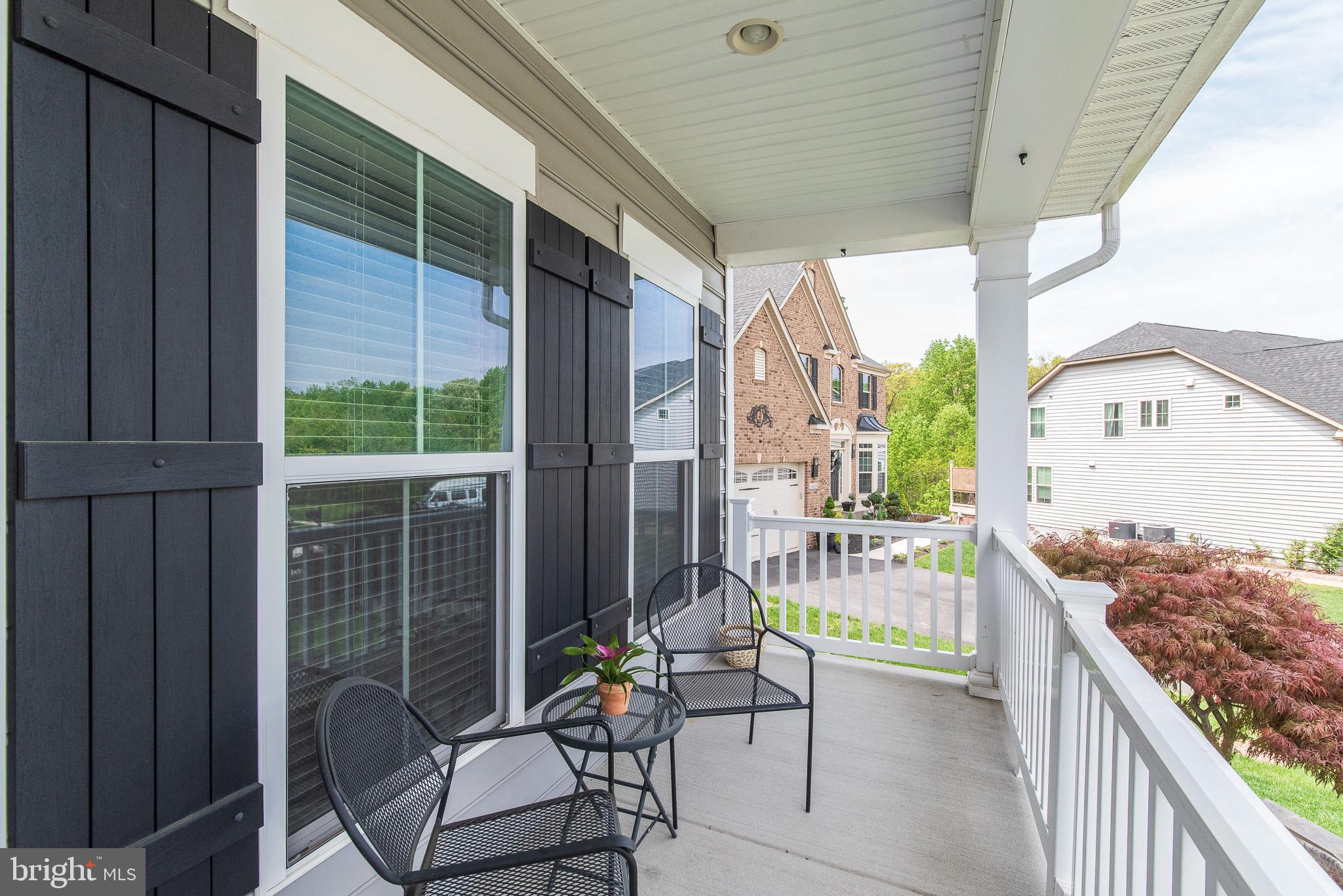 10426 Windlass Run Road Baltimore, MD 21220 - Photo 3 of 56 a view of balcony with furniture