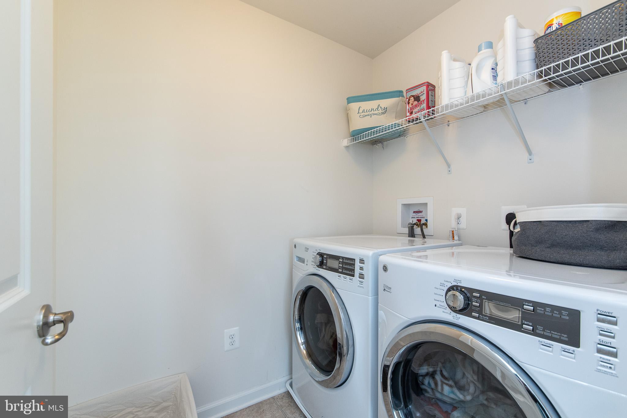 10426 Windlass Run Road Baltimore, MD 21220 - Photo 27 of 56 a utility room with dryer and washer