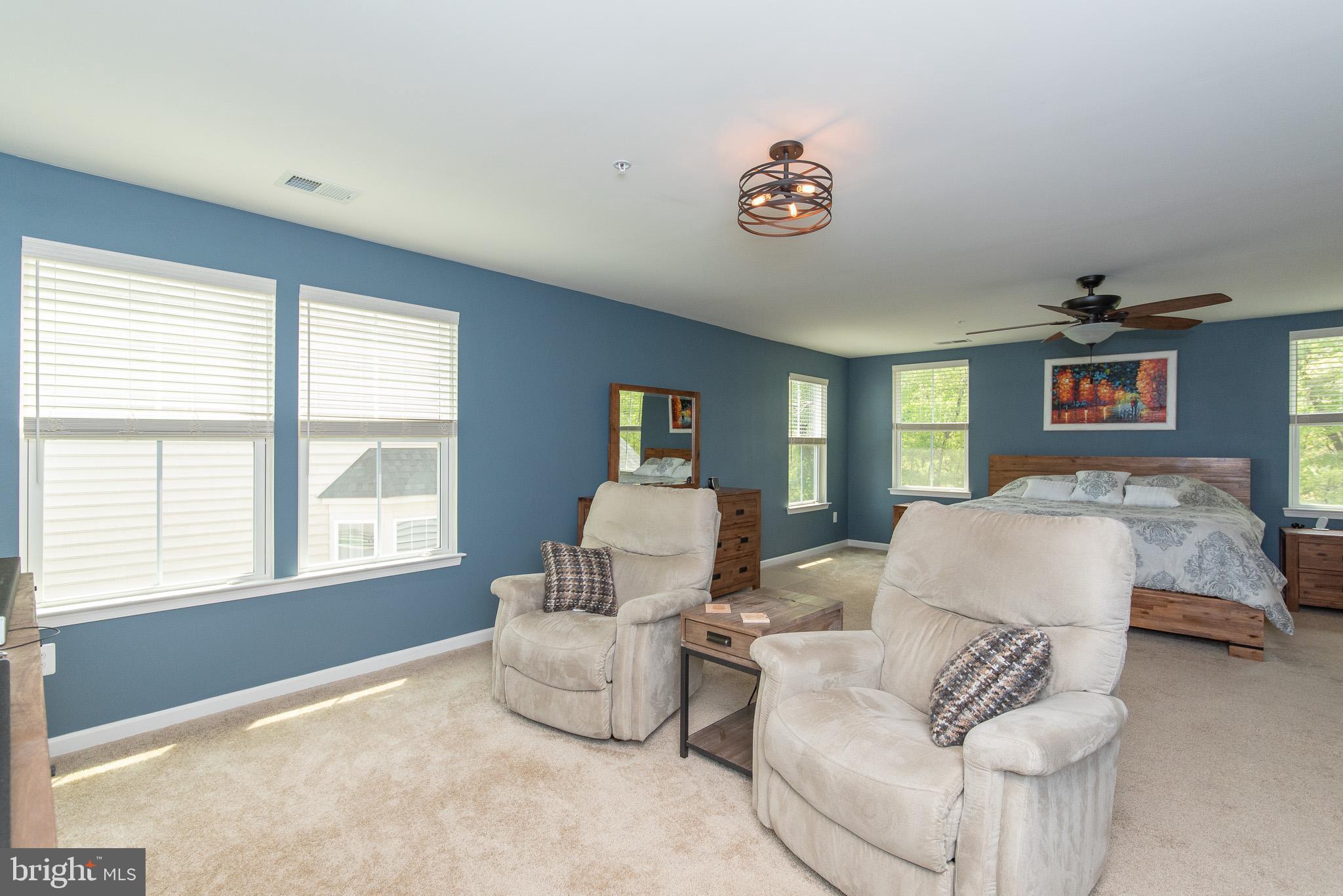 10426 Windlass Run Road Baltimore, MD 21220 - Photo 30 of 56 a living room with furniture and a large window