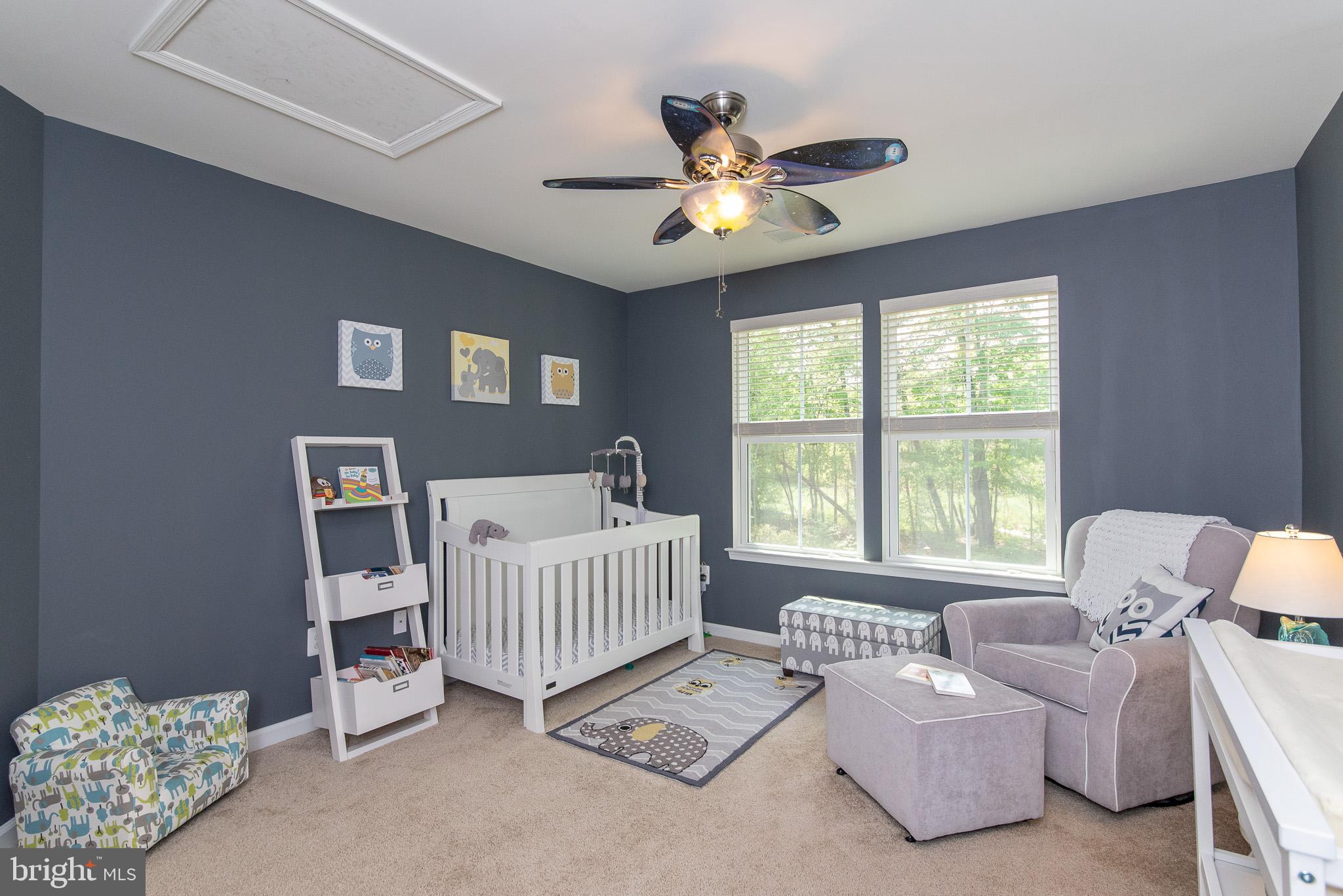10426 Windlass Run Road Baltimore, MD 21220 - Photo 39 of 56 a bedroom with a bed and a window