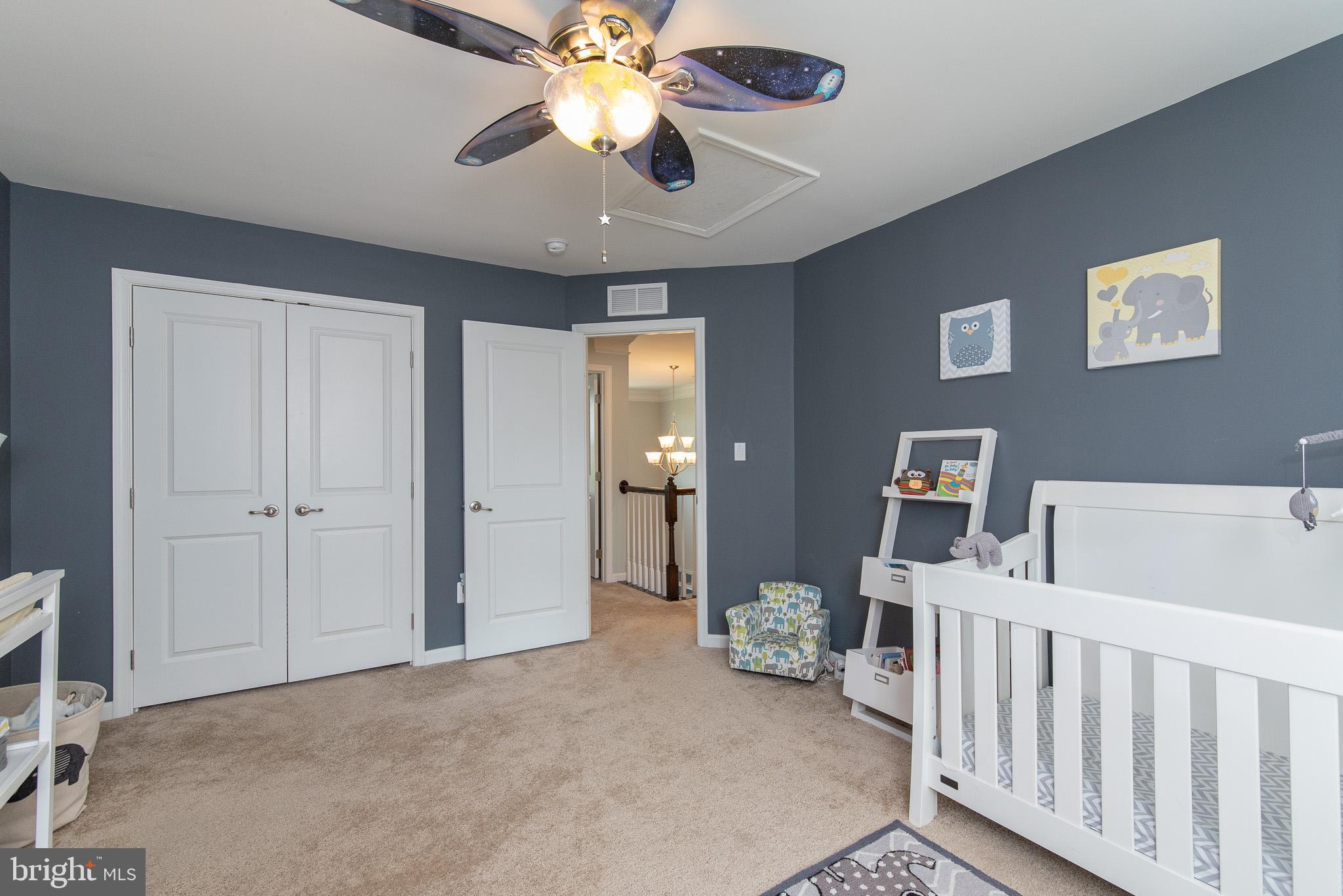 10426 Windlass Run Road Baltimore, MD 21220 - Photo 40 of 56 a view of a livingroom with a ceiling fan