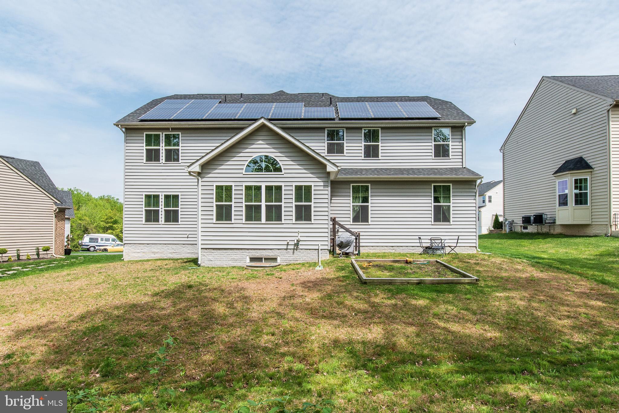 10426 Windlass Run Road Baltimore, MD 21220 - Photo 53 of 56 a house view with a garden space