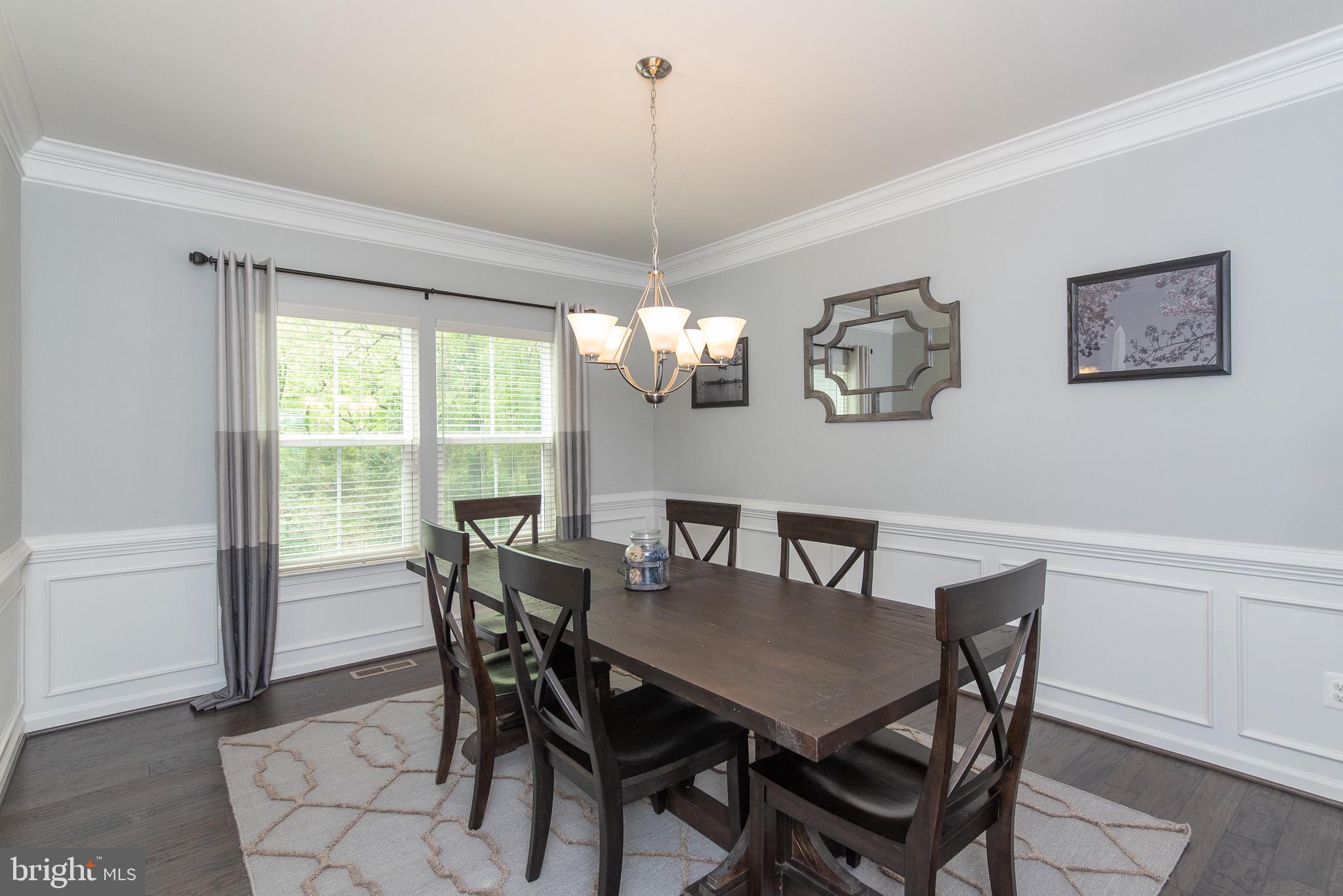10426 Windlass Run Road Baltimore, MD 21220 - Photo 9 of 56 a view of a dining room with furniture window and outside view