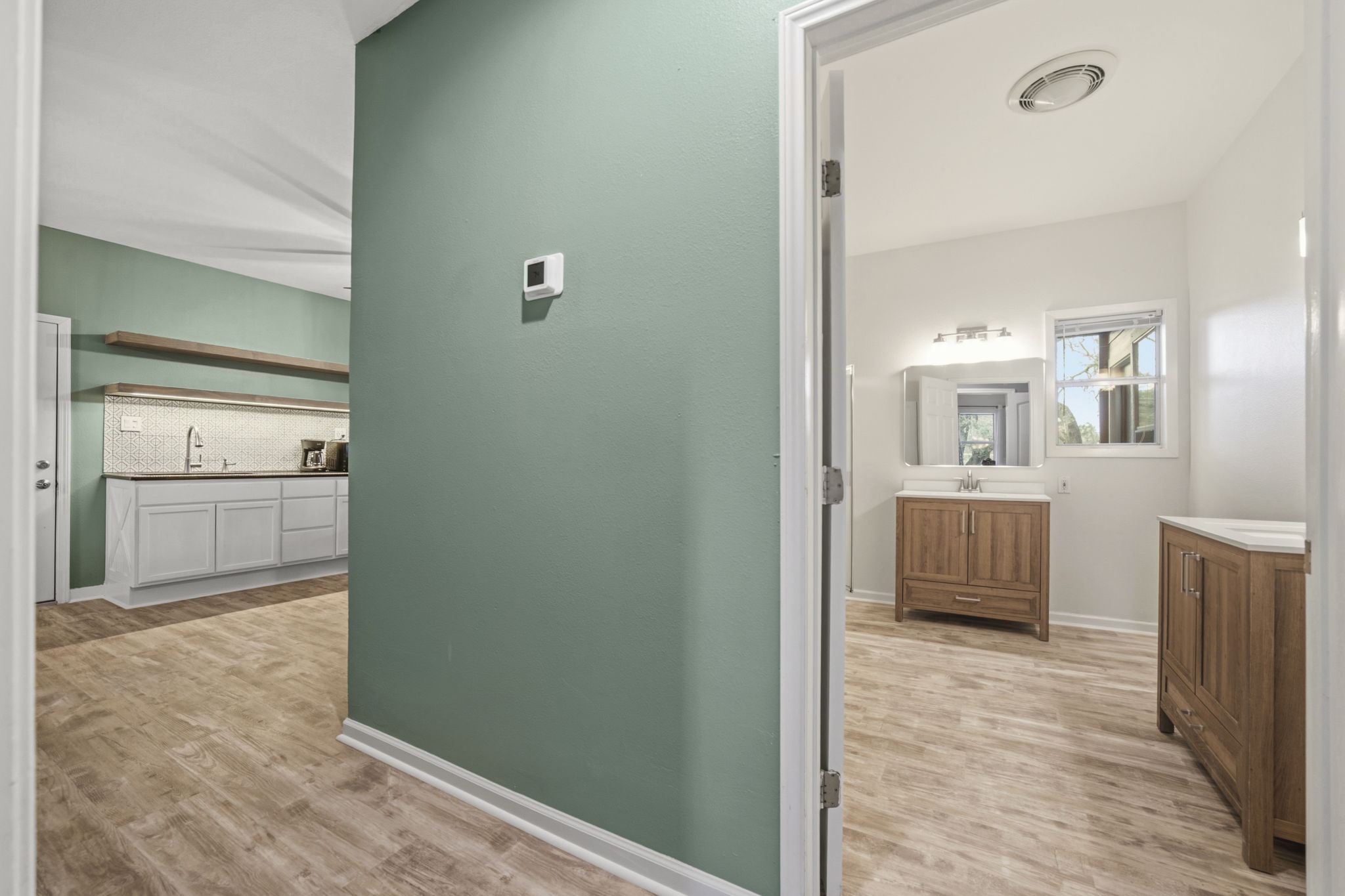 20001 Hamilton Pool Road Dripping Springs, TX 78620 - Photo 28 of 40 Newly renovated bathroom attached to kitchenette area in rear of the house.
