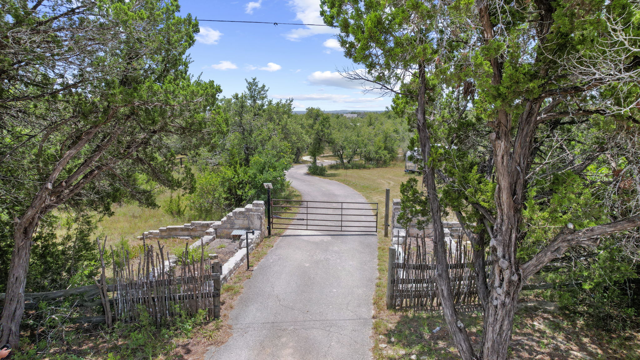 20001 Hamilton Pool Road Dripping Springs, TX 78620 - Photo 40 of 40 Gated front entry with keypad.