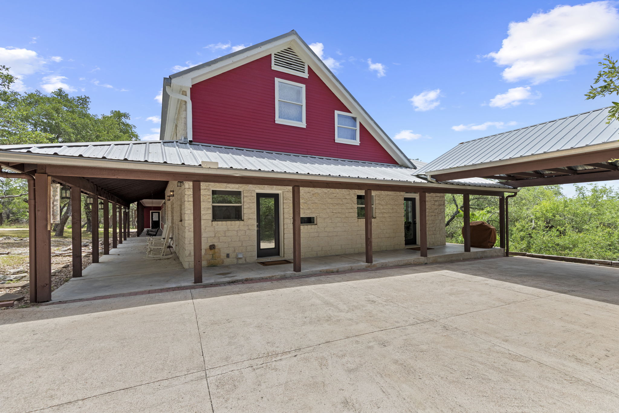 20001 Hamilton Pool Road Dripping Springs, TX 78620 - Photo 6 of 40 Additional carport area for more parking.