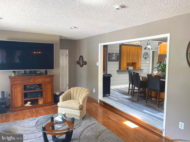 81 Plymouth Road Sicklerville, NJ 08081 - Photo 26 of 59 Family room with hardwood floor