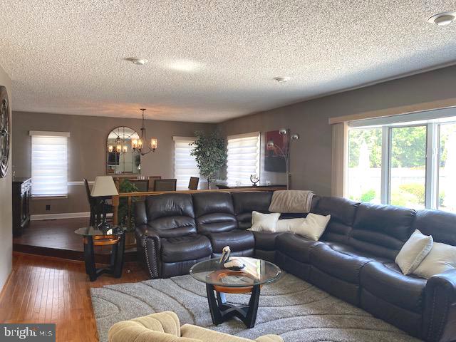 81 Plymouth Road Sicklerville, NJ 08081 - Photo 29 of 59 Family room looking into dining room