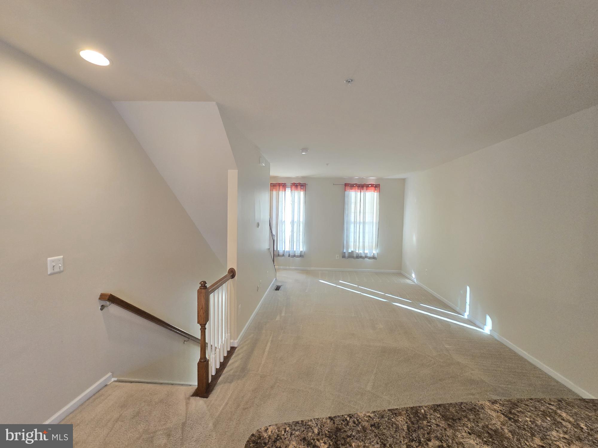 705 South Macon Street Baltimore, MD 21224 - Photo 12 of 29 an empty room with windows