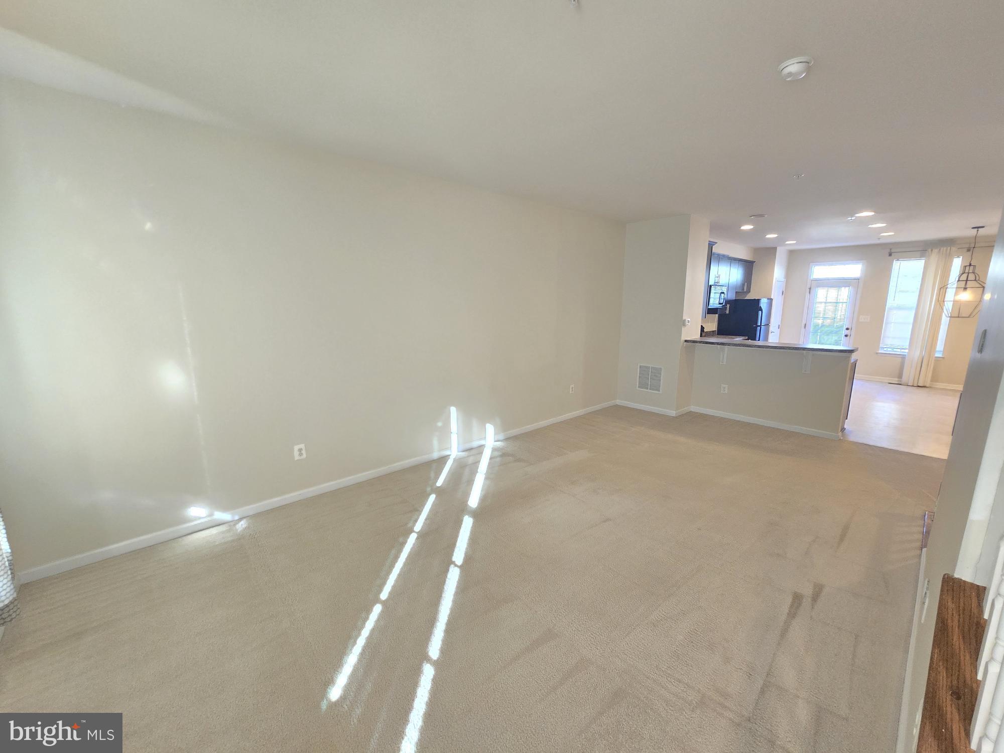 705 South Macon Street Baltimore, MD 21224 - Photo 16 of 29 a view of a livingroom with a staircase
